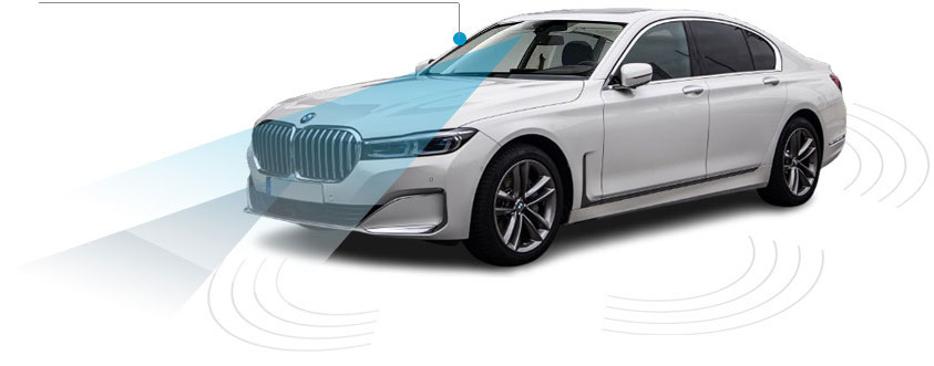 Car with forward-facing windshield camera requiring calibration after windshield replacement