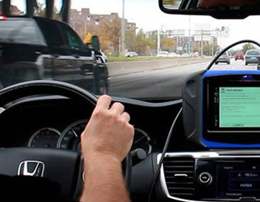 Dynamic ADAS calibration road test with diagnostic equipment connected while driving on streets