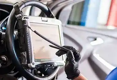 Technician running ADAS camera calibration after windshield replacement in Hawthorne