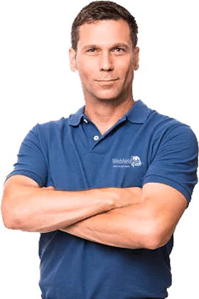 WindshieldHUB technician in blue polo shirt, arms crossed