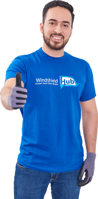WindshieldHUB technician in branded blue uniform after a windshield replacement in Midland