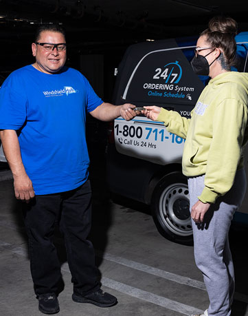 Certified technician completing a windshield crack repair in Seattle