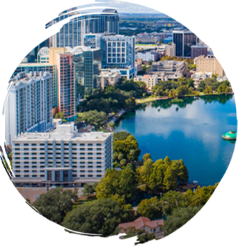 Aerial view of a bustling cityscape, representing the urban areas served by WindshieldHUB